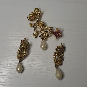 Set of earrings and brooch